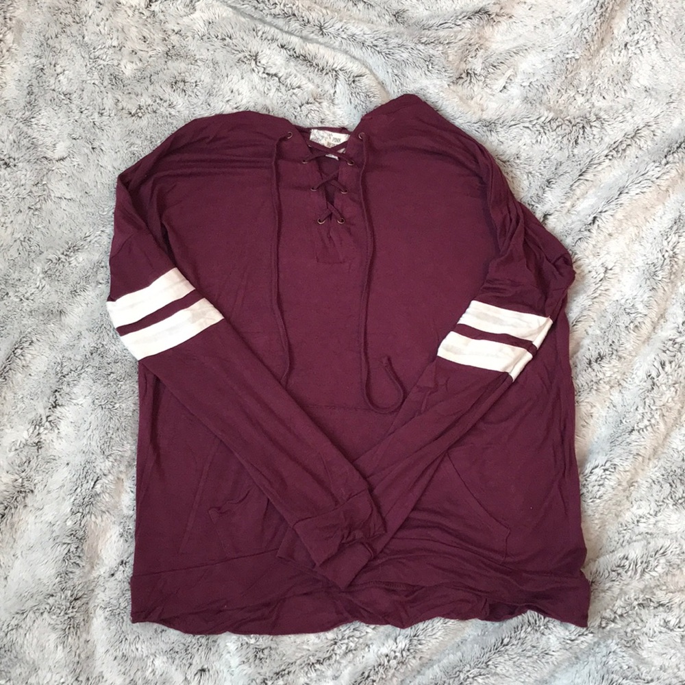 Maroon/purple long sleeve shirt.